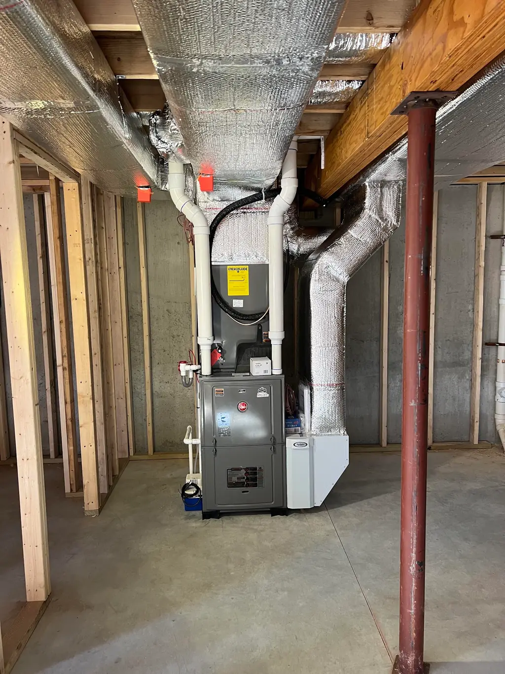 High-efficiency Rheem furnace installed in a South Jersey basement